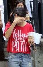 MILA KUNIS Leaves Joan