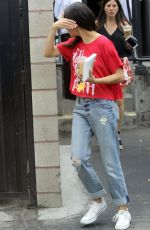MILA KUNIS Leaves Joan