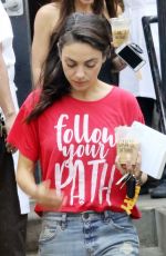 MILA KUNIS Leaves Joan