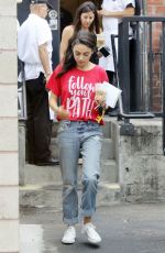 MILA KUNIS Leaves Joan