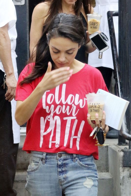 MILA KUNIS Leaves Joan