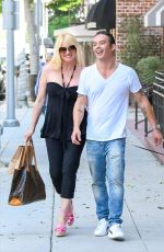 NICOLLETTE SHERIDAN Out with Her Dog in Los Angeles 07/11/2019