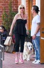 NICOLLETTE SHERIDAN Out with Her Dog in Los Angeles 07/11/2019