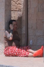 Pregnant AMBER ROSE and Alexander Edwards Out in Los Angeles 07/07/2019