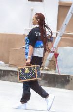 RIHANNA Arrives at Airport in Bridgetown 07/04/2019