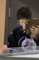 SELENA GOMEZ and Justin Bieber at a Hockey Game in Winnipeg 10/22/2011