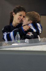 SELENA GOMEZ and Justin Bieber at a Hockey Game in Winnipeg 10/22/2011