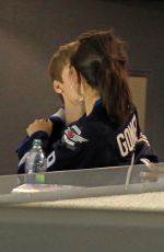 SELENA GOMEZ and Justin Bieber at a Hockey Game in Winnipeg 10/22/2011