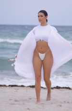 TAO WICKRATH in White Swimsuit on the Beach in Miami 07/24/2019