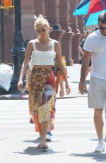 TAYLOR NEISEN and Liev Schreiber Out with Their Dog in New York 07/17/2019