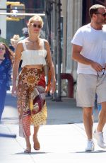 TAYLOR NEISEN and Liev Schreiber Out with Their Dog in New York 07/17/2019