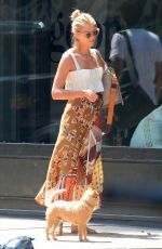 TAYLOR NEISEN and Liev Schreiber Out with Their Dog in New York 07/17/2019
