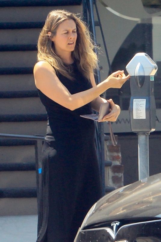 ALICIA SILVERSTONE Feeding Parking Meter in Beverly Hills 08/08/2019
