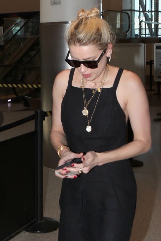 AMBER HEARD at LAX Airport in Los Angeles 08/15/2019