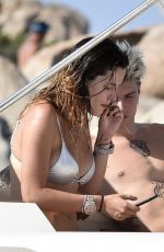 BELLA THORNE in Bikini and Beanjamin Mascolo at a Boat in Sardinia 08/21/2019