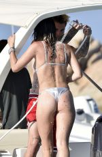 BELLA THORNE in Bikini and Beanjamin Mascolo at a Boat in Sardinia 08/21/2019