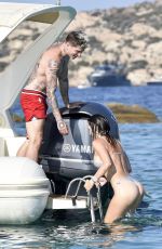 BELLA THORNE in Bikini and Beanjamin Mascolo at a Boat in Sardinia 08/21/2019