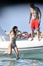 BELLA THORNE in Bikini and Beanjamin Mascolo at a Boat in Sardinia 08/21/2019