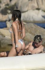BELLA THORNE in Bikini and Beanjamin Mascolo at a Boat in Sardinia 08/21/2019