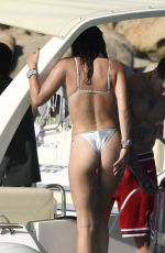 BELLA THORNE in Bikini and Beanjamin Mascolo at a Boat in Sardinia 08/21/2019