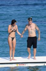 BELLA THORNE in Black Bikini on Vacation in Sardinia 08/25/2019