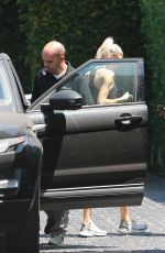 CHARLOTTE MCKINNEY Arrives at Cecconi
