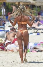 CHRISTINIE MCGUINNESS in Bikini at a Beach in Spain 08/20/2019