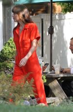 DAKOTA JOHNSON and Chris Martin Out for Lunch in The Hampton