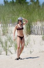 DAKOTA JOHNSON in Bikini at a Beach in Hamptons 08/04/2019