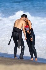 DUA LIPA in Swimsuit and Anwar Hadid on the Beach in Malibu 08/23/2019