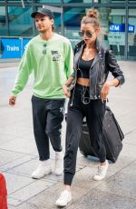 ELEANOR CALDER and Louis Tomlinson at Heathrow Airport 08/28/2019