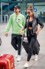 ELEANOR CALDER and Louis Tomlinson at Heathrow Airport 08/28/2019