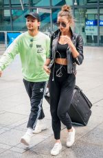 ELEANOR CALDER and Louis Tomlinson at Heathrow Airport 08/28/2019