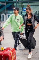 ELEANOR CALDER and Louis Tomlinson at Heathrow Airport 08/28/2019