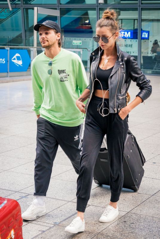 ELEANOR CALDER and Louis Tomlinson at Heathrow Airport 08/28/2019