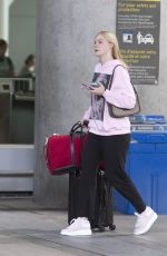 ELLE FANNING at Airport in Toronto 08/05/2019