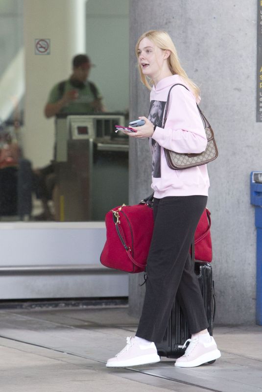 ELLE FANNING at Airport in Toronto 08/05/2019