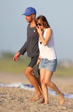 GWYNETH PLALTROW, DAKOTA JOHNSON, Brad Falchuk and Chris Martin at a Beach in The Hamptons 08/05/2019