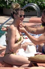 HEIDI KLUM in Bikini at a Pool in Capri 07/29/2019