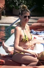 HEIDI KLUM in Bikini at a Pool in Capri 07/29/2019