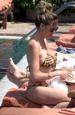 HEIDI KLUM in Bikini at a Pool in Capri 07/29/2019