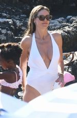 HEIDI KLUM in White Swimsuit at a Beach in Capri 08/05/2019