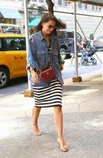 KATIE HOLMES Leaves a Cab in New York 08/18/2019