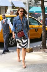 KATIE HOLMES Leaves a Cab in New York 08/18/2019