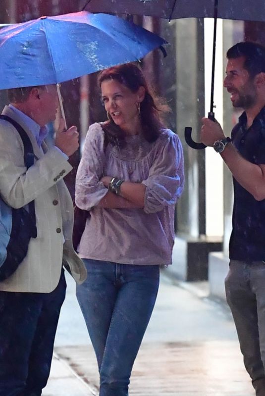 KATIE HOLMES Out on a Rainy Day in New York 08/07/2019