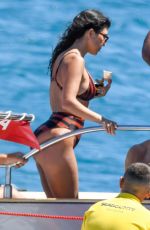 KOURTNEY KARDASHIAN in Bikini at a Boat in Sardinia 07/30/2019