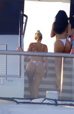 KYLIE JENNER and ANASTASIA KARANIKOLAOU in Bikinis at a Yach in Capri 08/09/2019