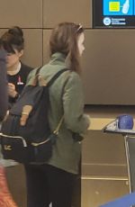 LILY COLLINS at Los Angeles International Airport 08/03/2019