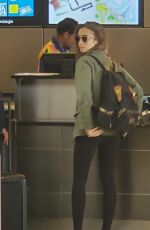 LILY COLLINS at Los Angeles International Airport 08/03/2019