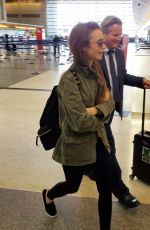 LILY COLLINS at Los Angeles International Airport 08/03/2019